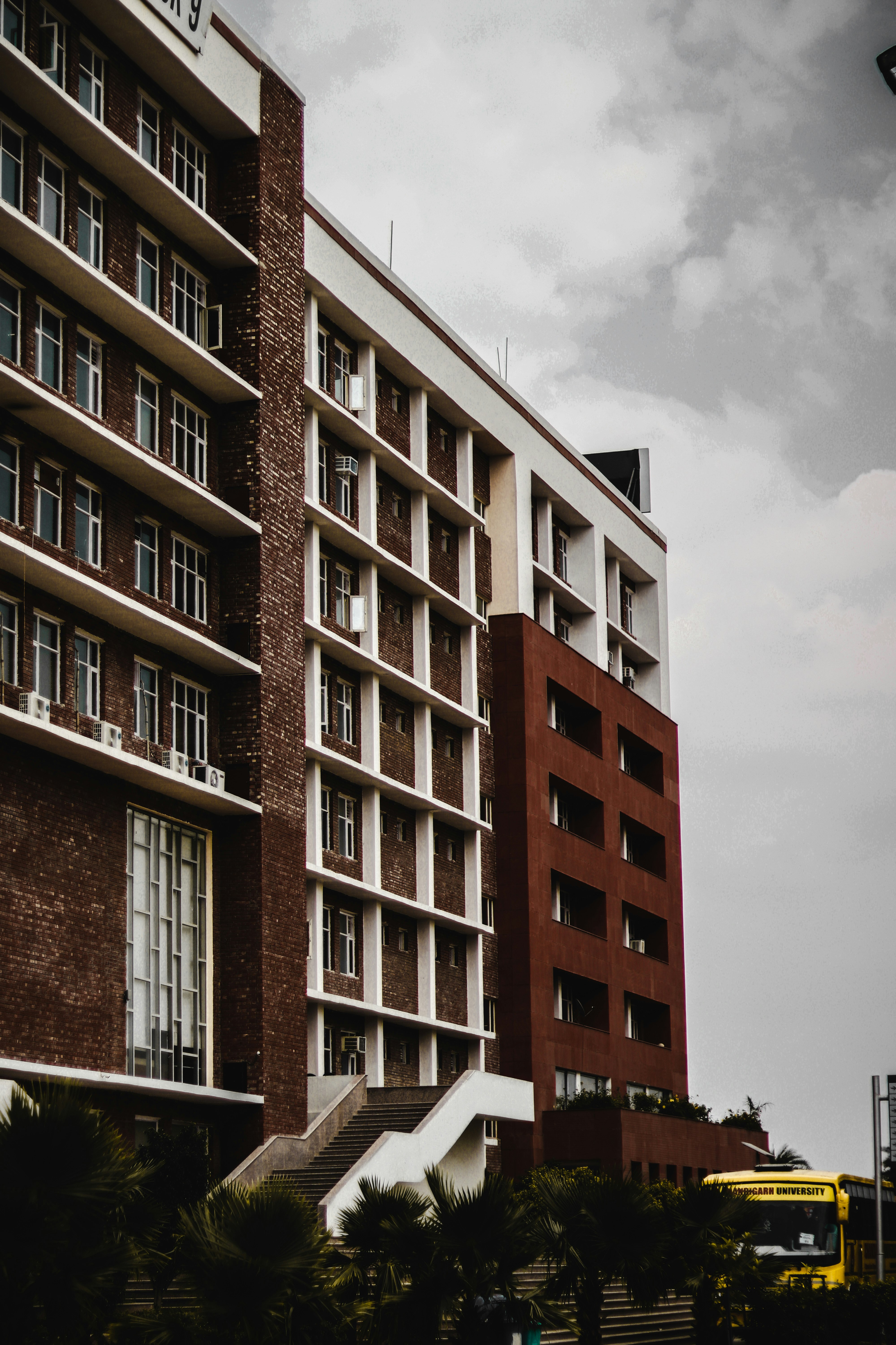 brown concrete high-rise building